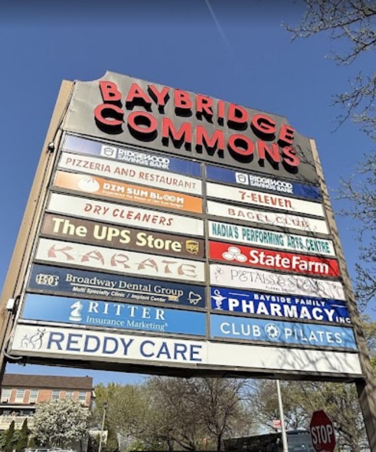 Baybridge Commons plaza directory sign listing Bayside Family Pharmacy